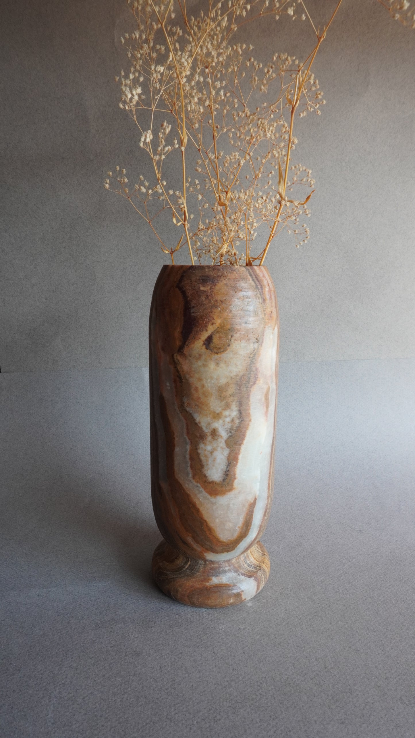 Onyx vase styled with dried florals, tall hand-carved stone vessel for minimal, organic modern home decor