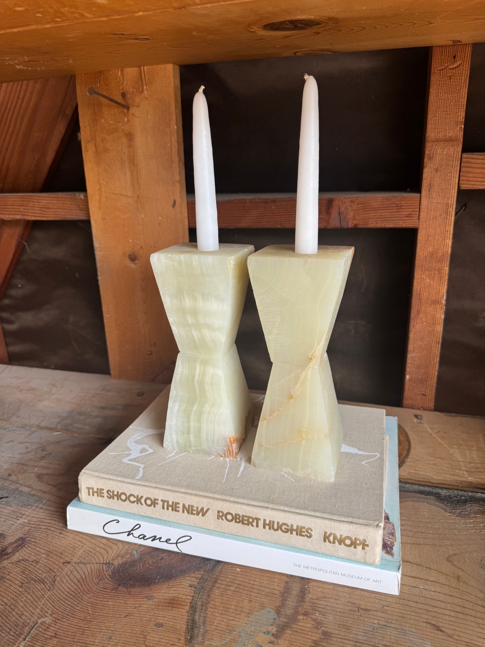 Natural stone candle holders in neutral green tones shown from multiple angles