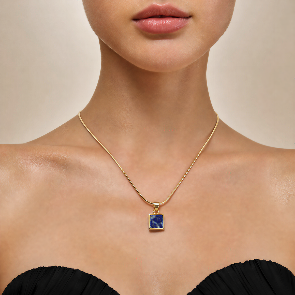 blue lapis lazuli necklace on a gold snake chain