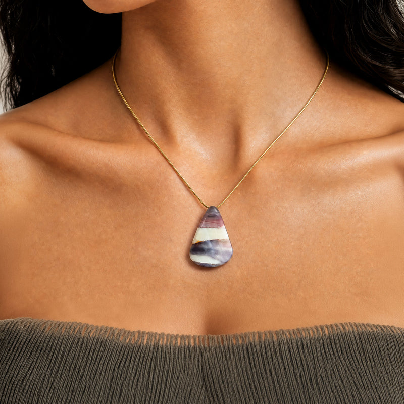 Gold snake herringbone chain 20 inch Necklace with a multicolored mookaite jasper purple lavender pendant worn by a woman