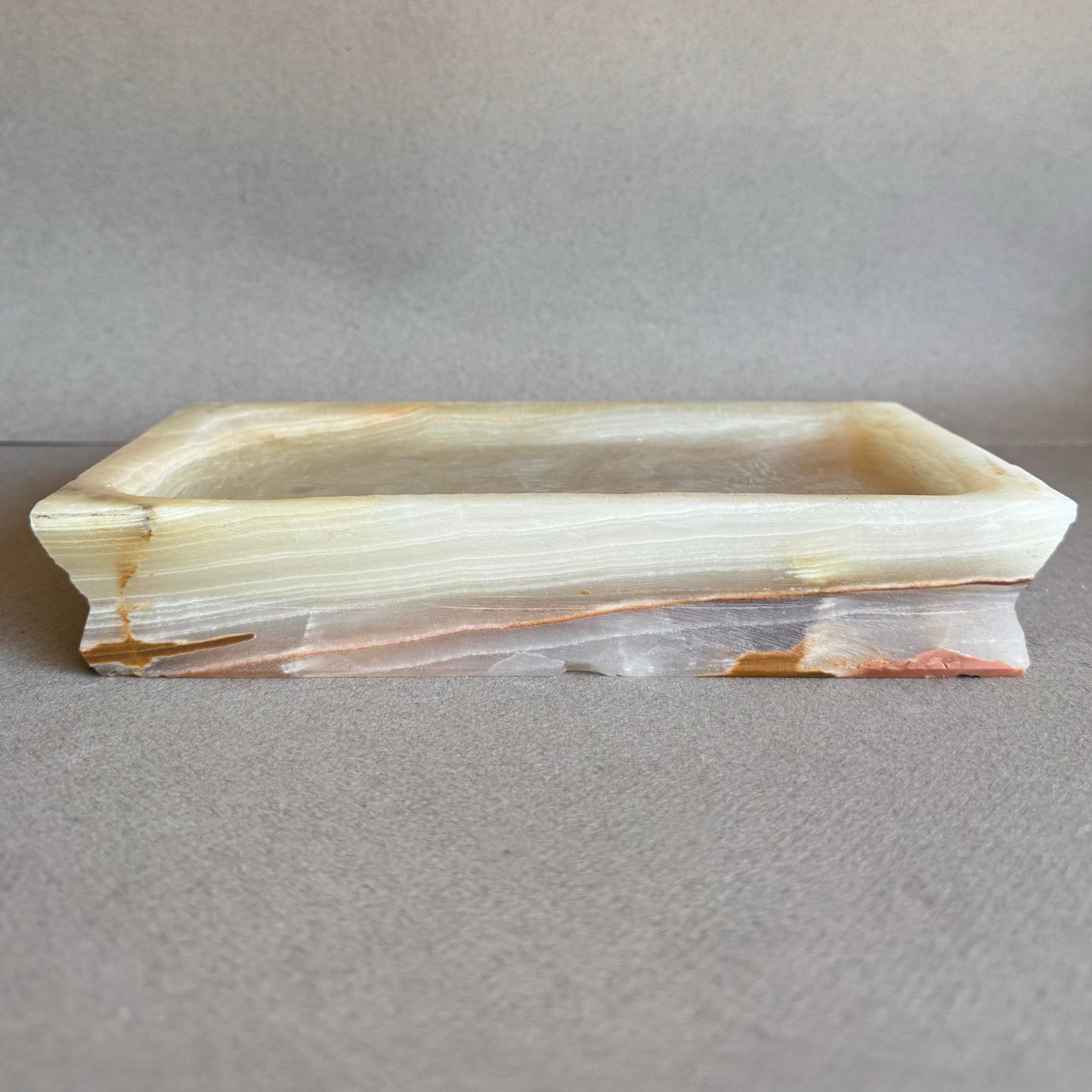 front view of hand carved onyx catchall tray in cream blush