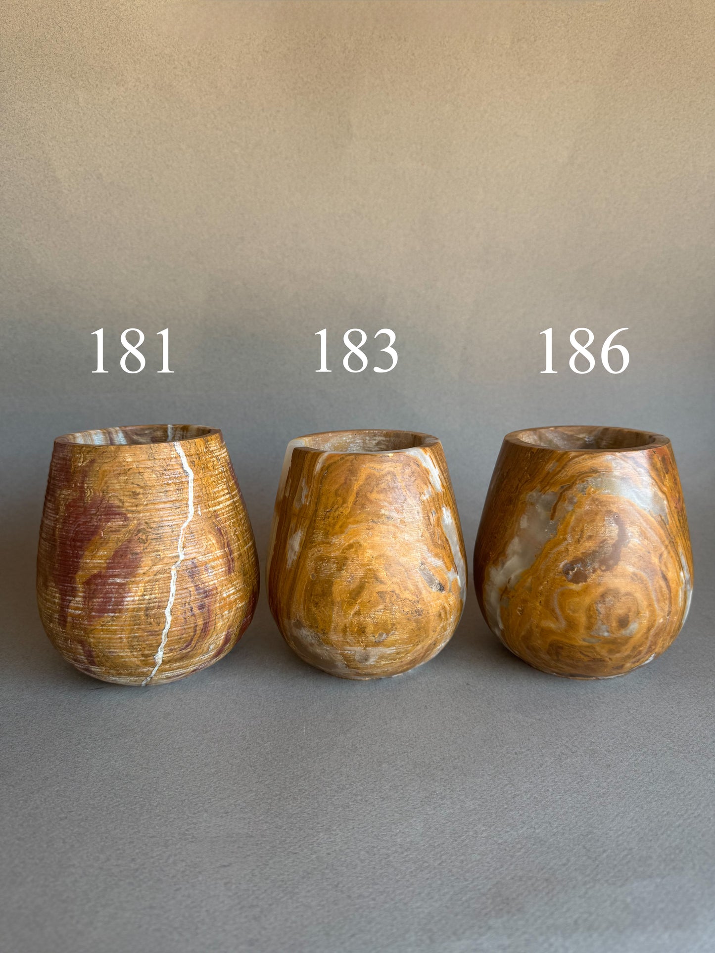Clay, rust, and dusk | SAÉA Curved Onyx Vessel
