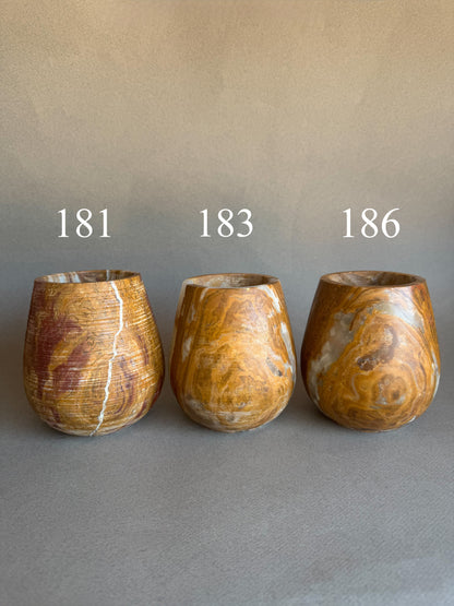 Clay, rust, and dusk | SAÉA Curved Onyx Vessel