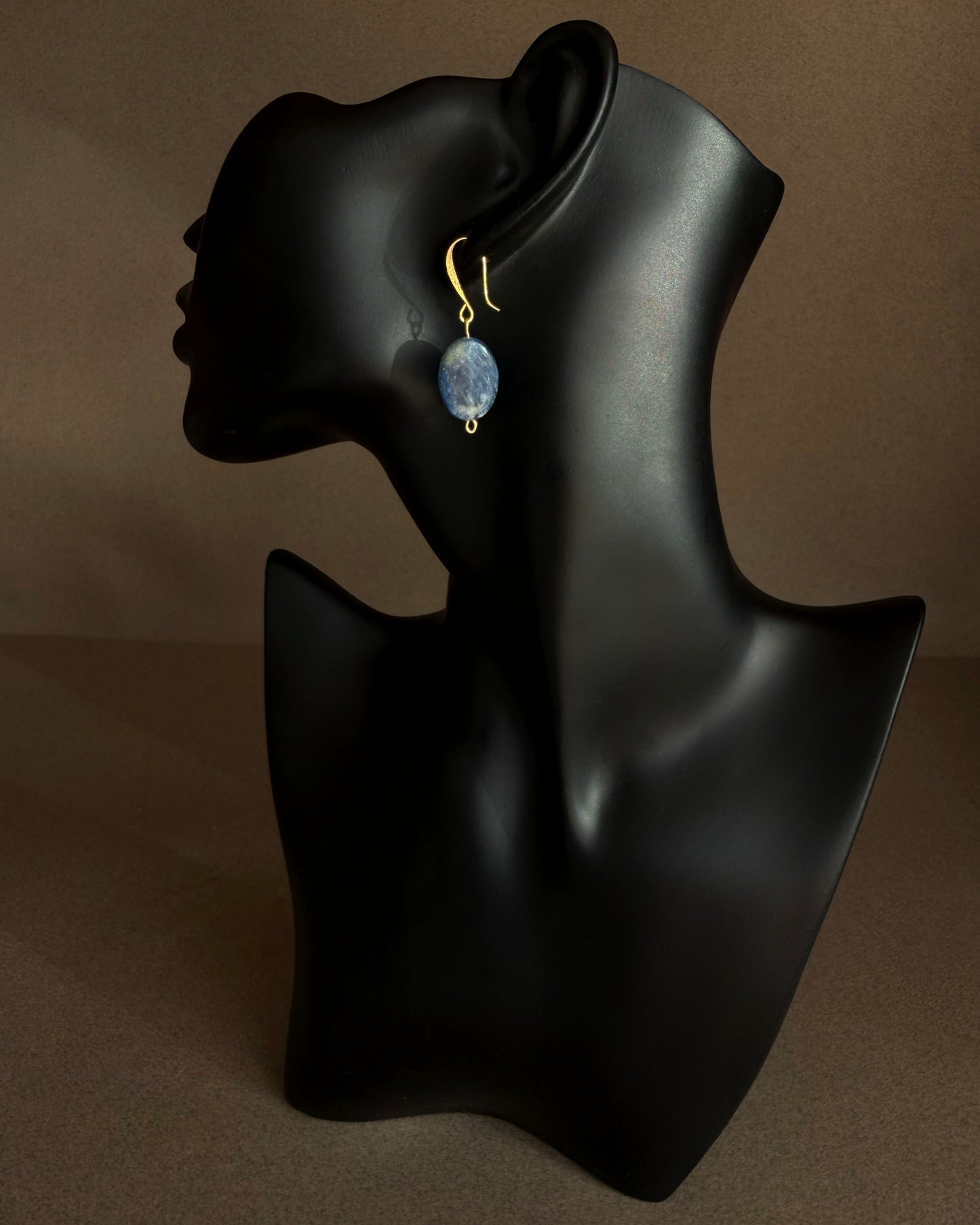 Close-up of blue kyanite gemstone earrings highlighting organic texture and lightweight design
