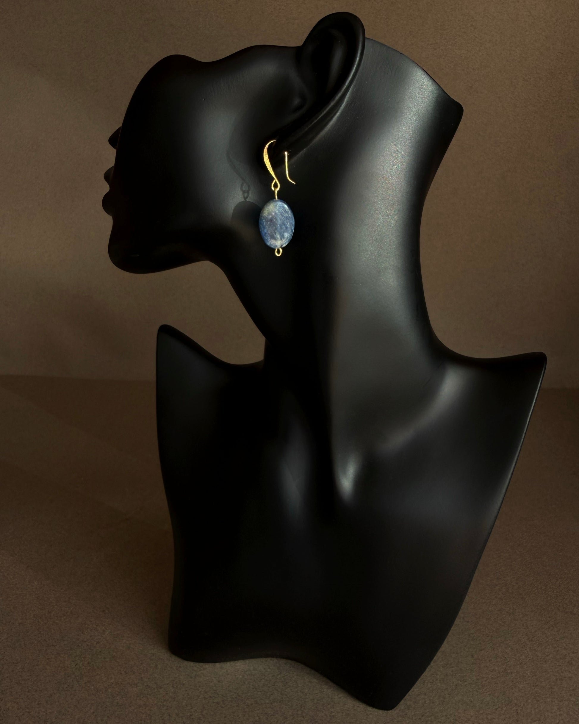 Close-up of blue kyanite gemstone earrings highlighting organic texture and lightweight design
