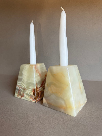 SAÉA sculptural candle holders styled with beeswax taper candles

