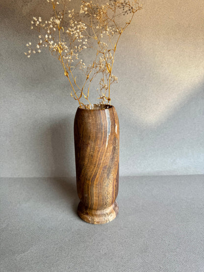 Sculptural onyx vase with flared pedestal base

