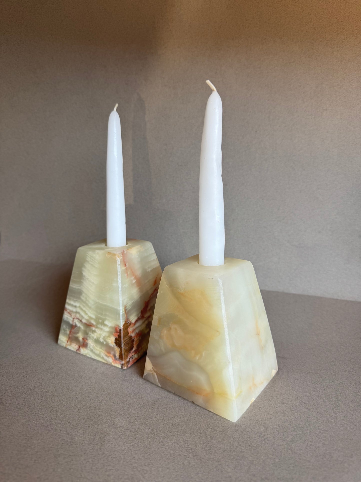 Pyramid candle holders with complementary taper candles and SAÉA tote


