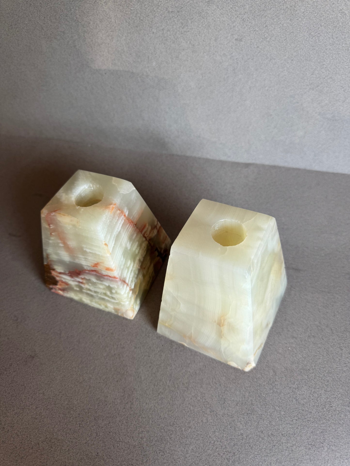 Close-up of translucent amber green onyx stone with marbled veining


