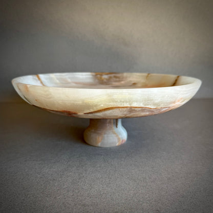 SAEA DESIGNS Decorative stone pedestal bowl against a neutral background