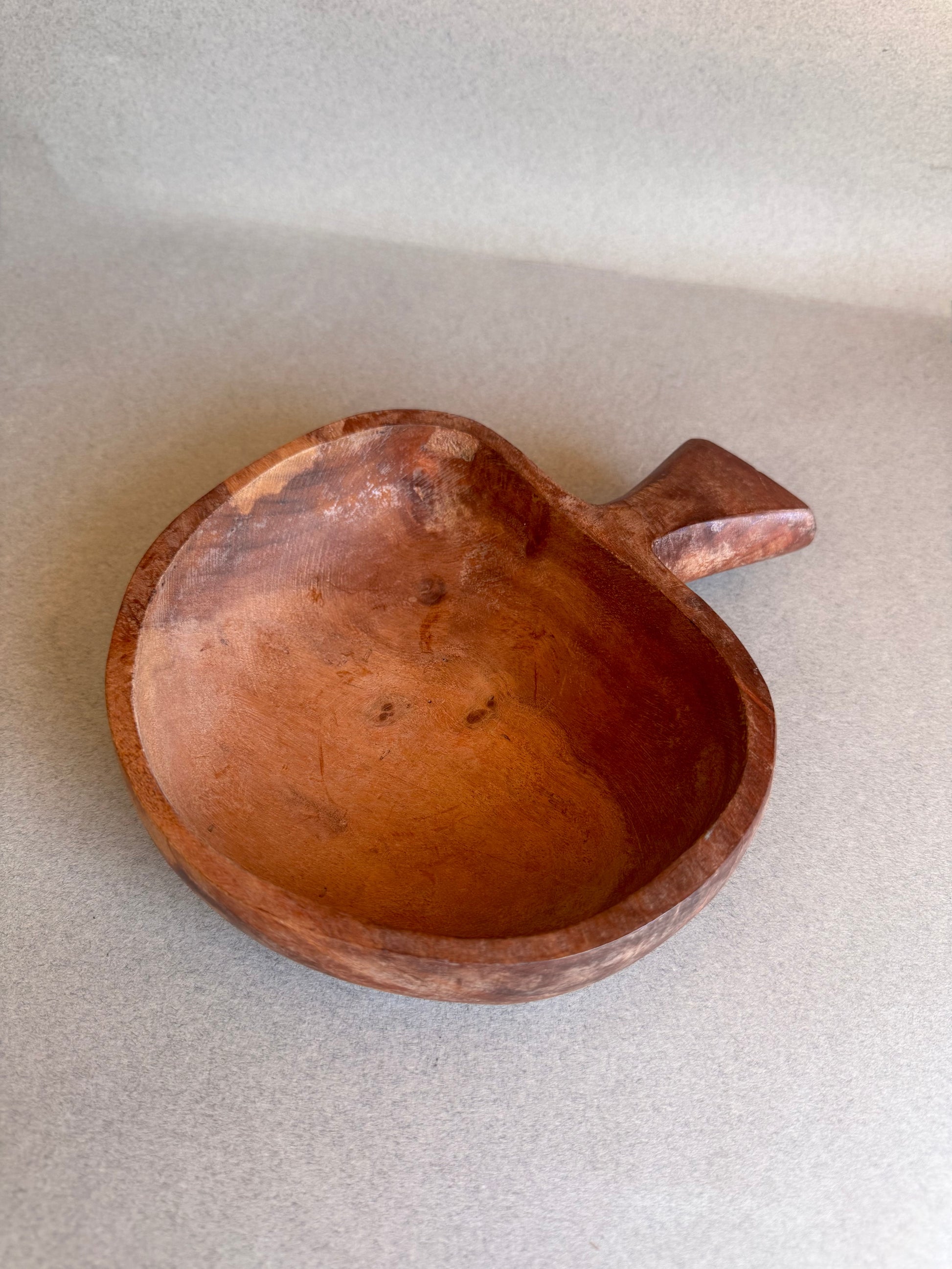 SAÉA DESIGNS SAEA HAND-carved wood bowl in a whimsical mushroom silhouette, showing natural grain, knots, and aged wear.