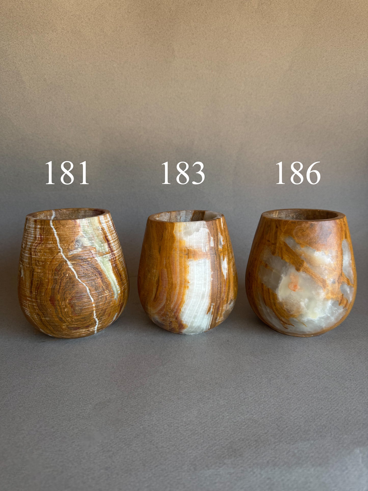 Clay, rust, and dusk | SAÉA Curved Onyx Vessel