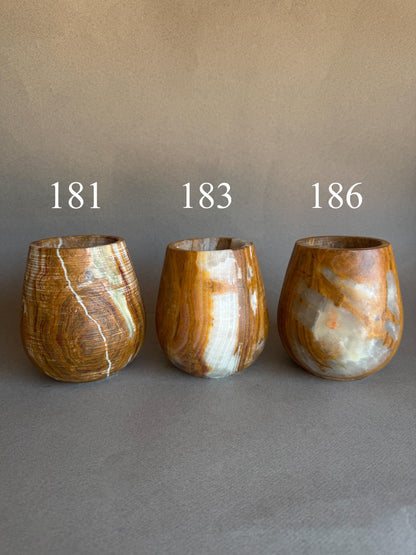 Clay, rust, and dusk | SAÉA Curved Onyx Vessel