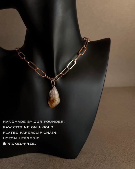 Minimal gold chain necklace with raw citrine crystal pendant, earthy modern statement jewelry
