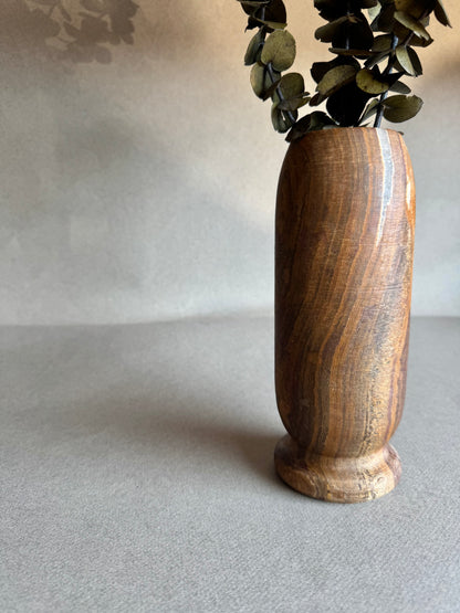 Tall onyx vase with burnt sienna and espresso veining

