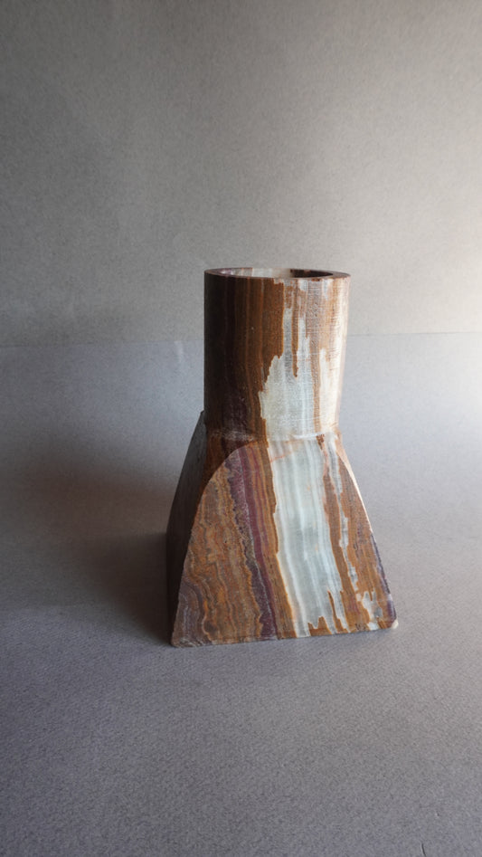 Onyx brown vase  a gray background