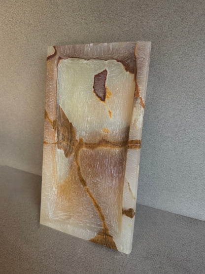 Decorative stone with natural patterns on a gray background
