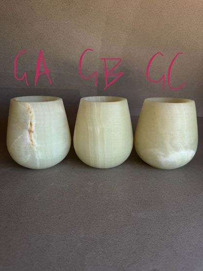 Three light green onyx vessels labeled GA, GB, GC on a gray background