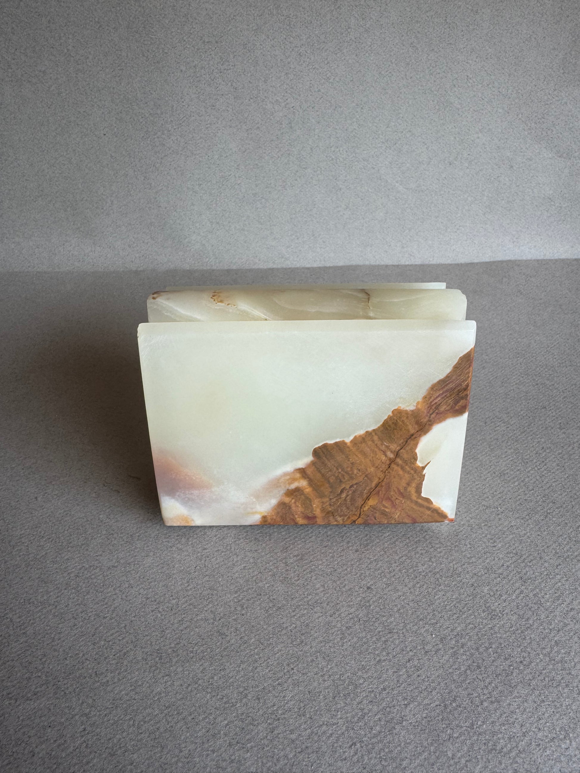 back view of onyx box styled on shelf as sculptural home decor piece

