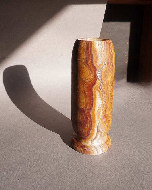 Onyx vase with earthy mineral striations, ideal for pampas grass, branches, or dried flowers

