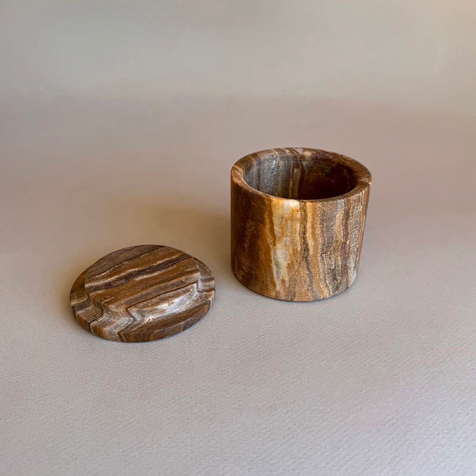 salt cellar made of onyx stone or wood brown