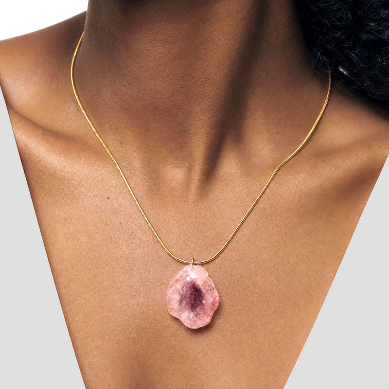 gold snake chain Necklace with a pink agate pendant on a white background