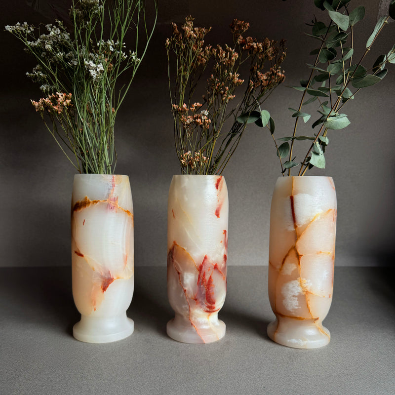 Hand carved blush pink and cream onyx Origin vases with dried florals, 8x3 natural stone sculptural flower vases with honey and rust veining
