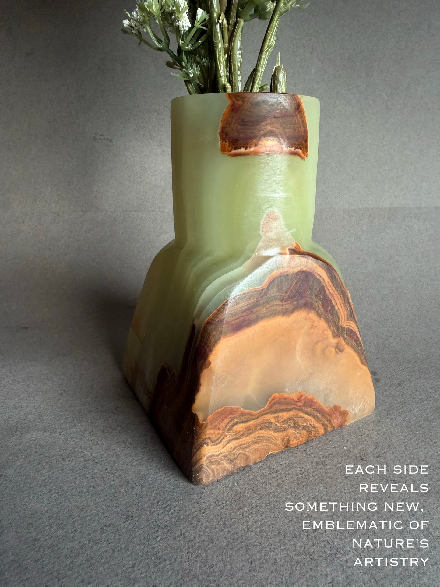 Sculptural onyx dune vase featuring flowing green stone and earthy brown banding, handmade stone vase
