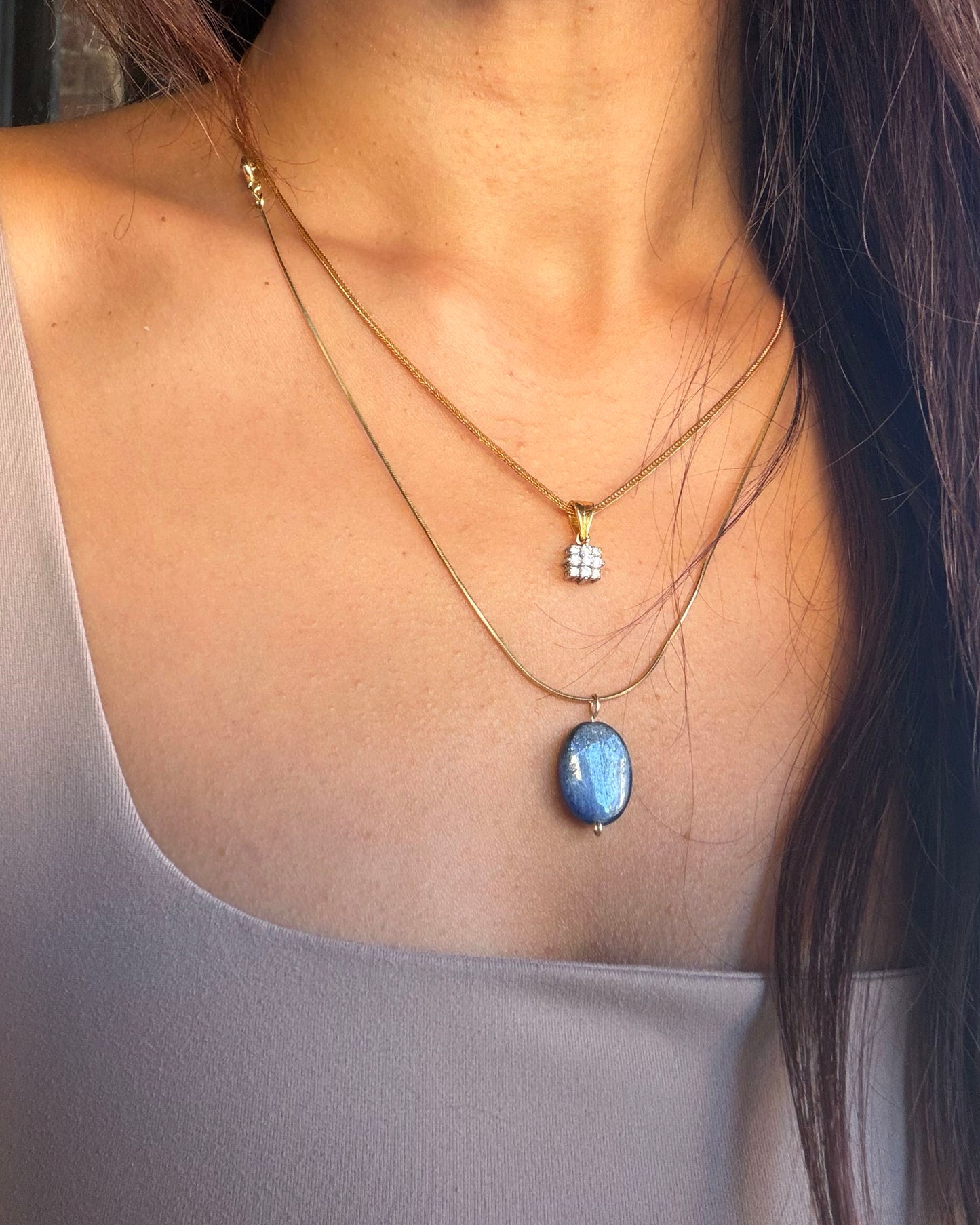 Gold 14k filled chain shown in 18 inch and 20 inch length options with blue kyanite pendant for size comparison.
