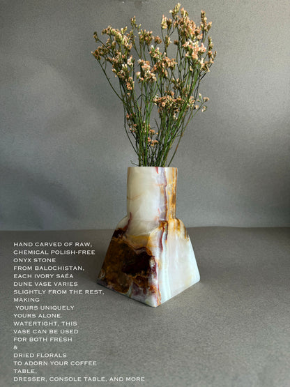 Sculptural hand-carved onyx dune vase for fresh or dried florals
