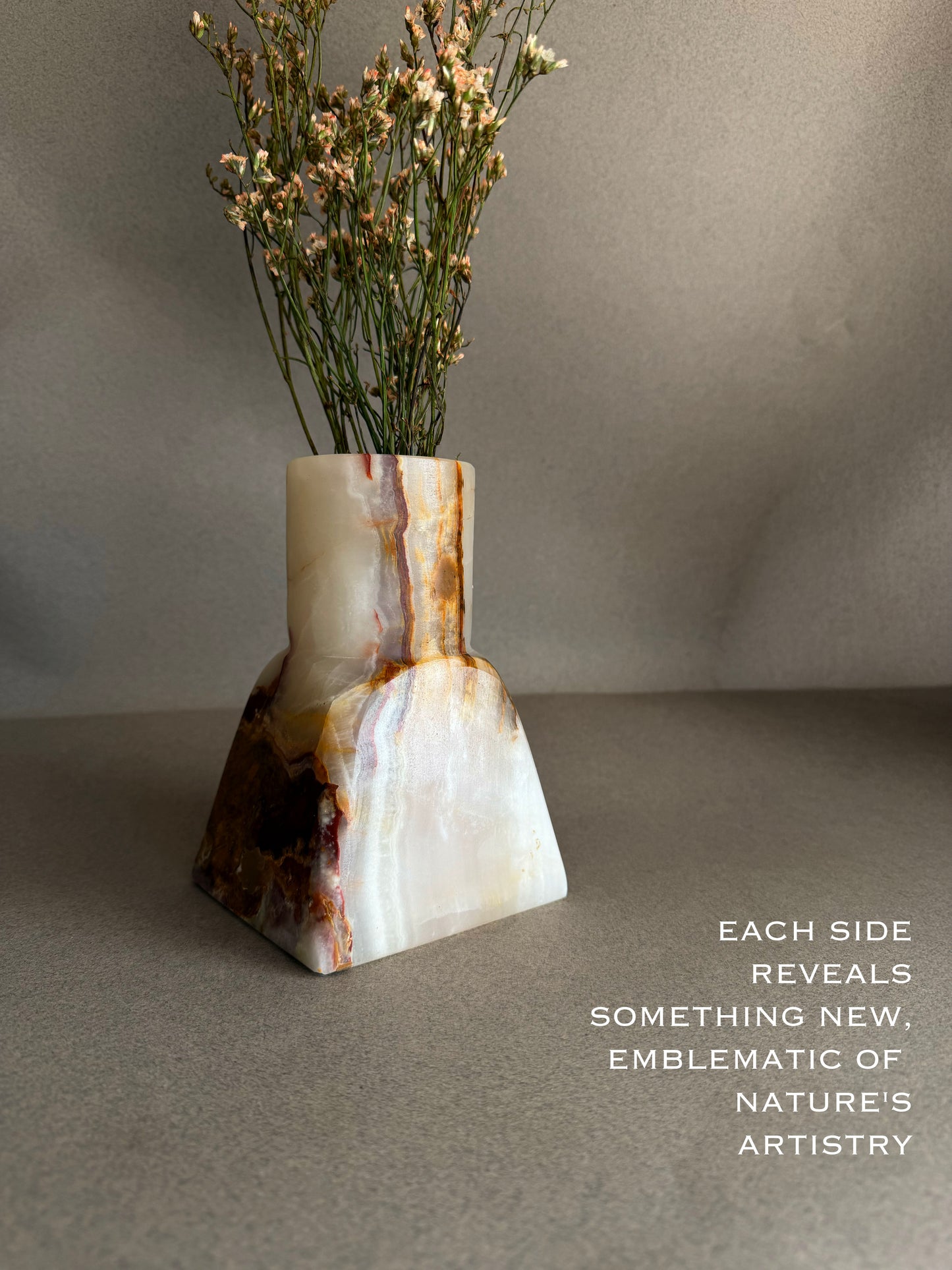 Close-up of translucent lavender onyx stone vase
