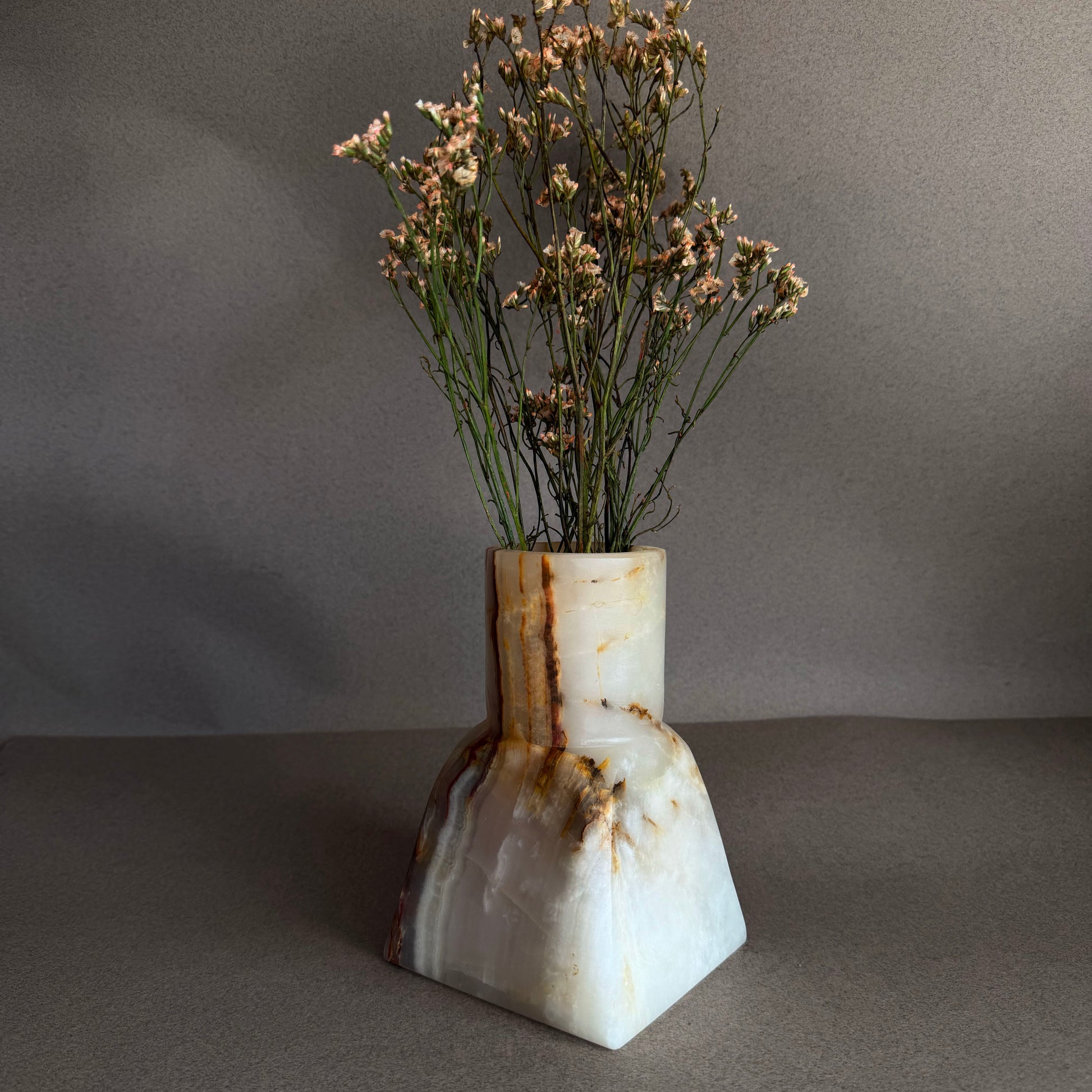 Natural lavender onyx vase styled with dried florals
