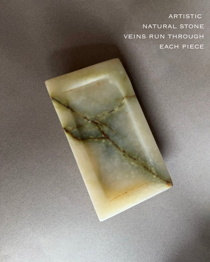 Marble stone tray green white with artistic natural stone veins on a gray background