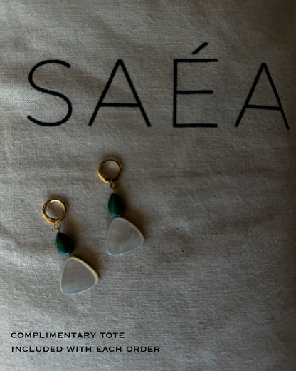 Pair of earrings with green beads on a textured surface with 'saéa' branding. MALACHITE MOTHER OF PEARL GOLD HOOP HUGGIE 