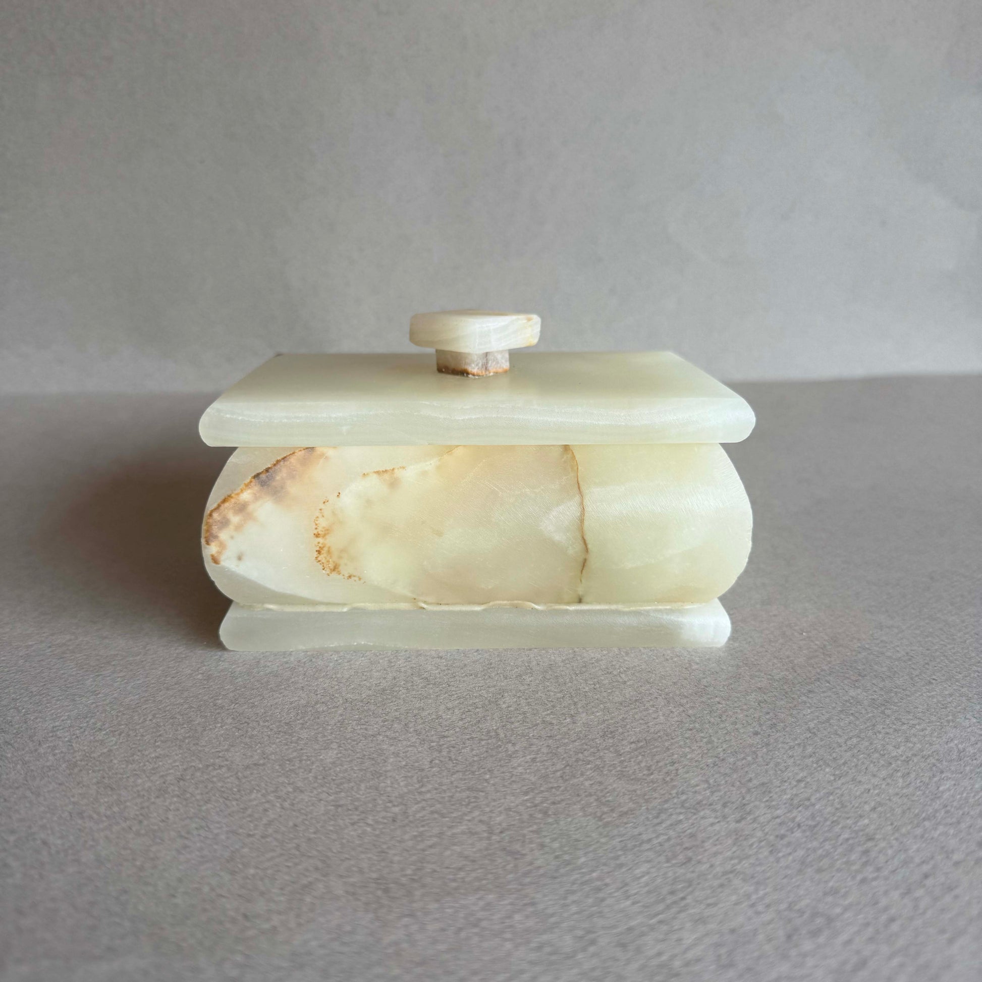 Rectangular onyx keepsake box with lid in nude green, ivory, and clay tones

