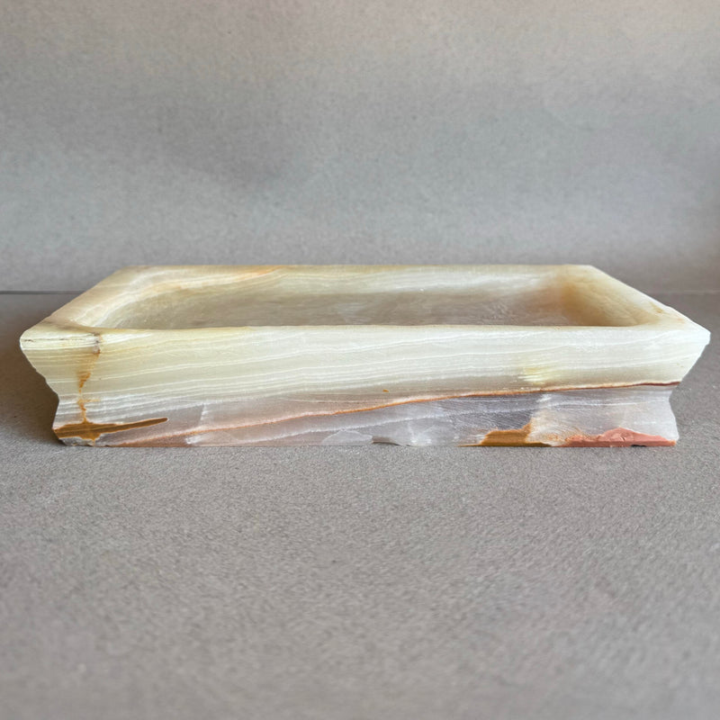 front view of hand carved onyx catchall tray in cream blush