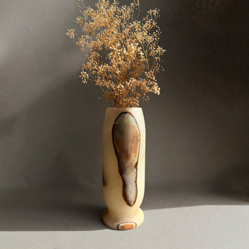 Hand-carved green onyx stone vase with dried baby's breath florals, sage green and cream banded veining on warm neutral background, SAÉA Designs