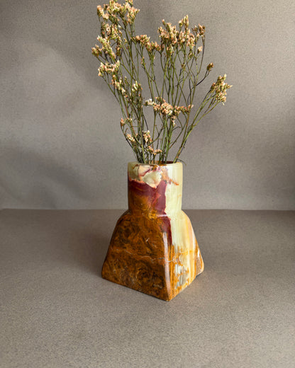 Natural stone onyx vase with translucent green body and warm brown marbling, wabi sabi home accent
