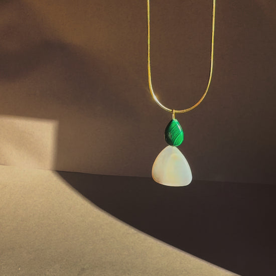 gold snake chain herringbone necklace with a malachite mother of pearl pendant