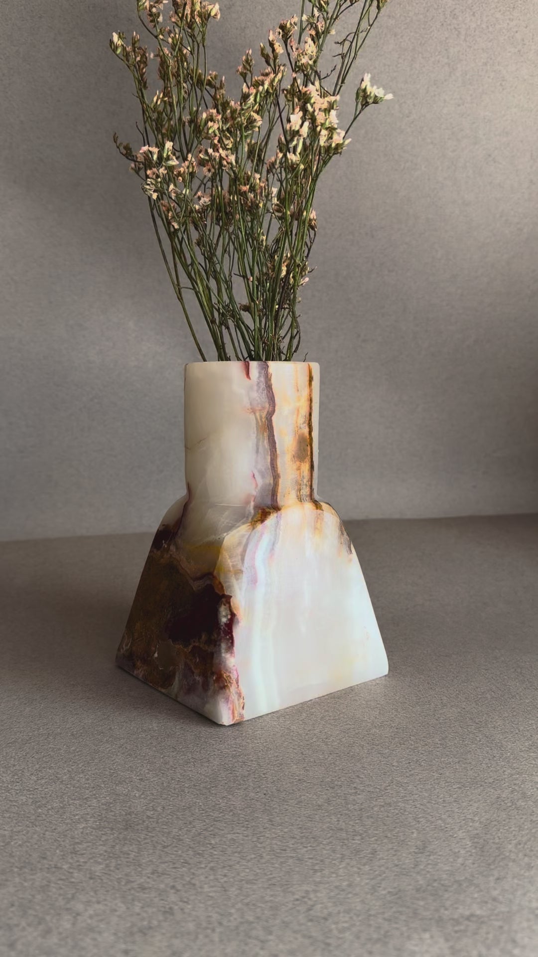 Hand-carved lavender onyx vase with soft cream and rust veining
