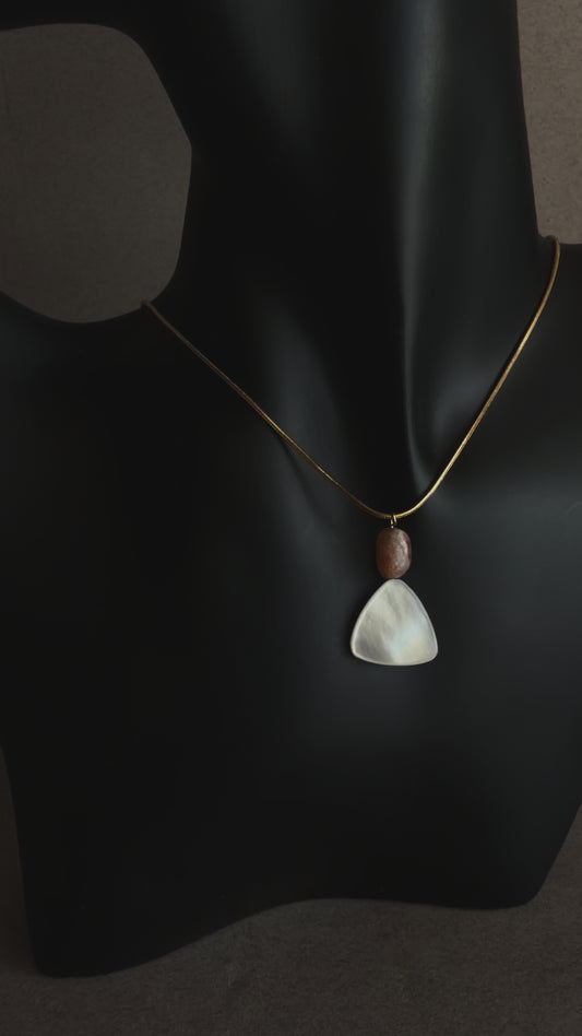 Minimal mother of pearl necklace with sunstone bead on gold snake chain
