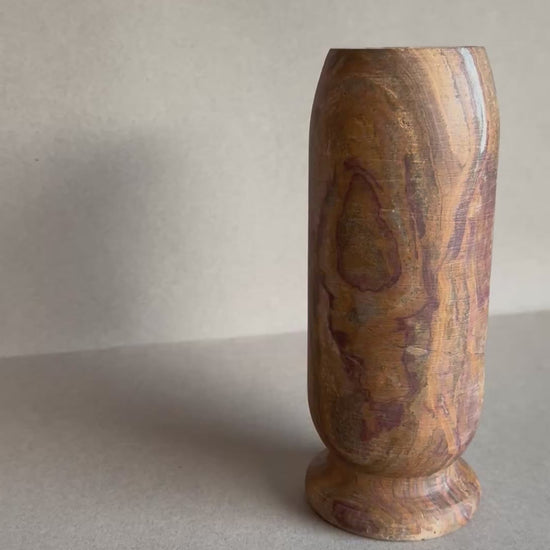 Ochre and plum onyx vase with natural stone banding
