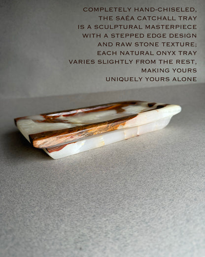 Onyx catchall tray with text on a gray background