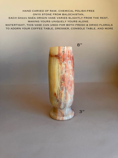 Hand-carved onyx vase with dimensions and description text on a gray background