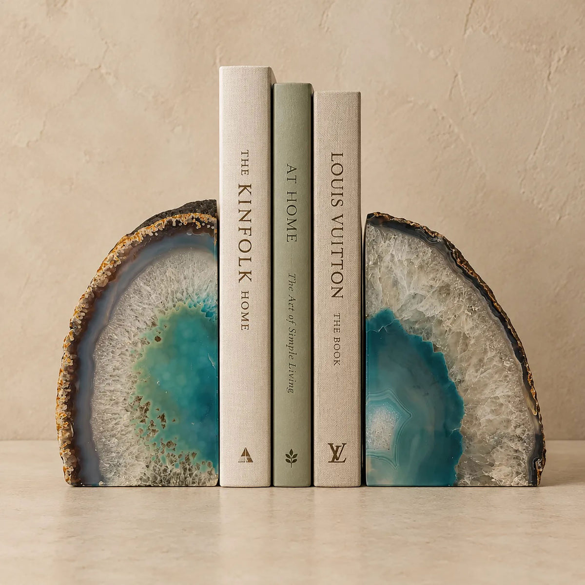 Pair of teal and white agate geode bookends, front view of both cut faces from one geode