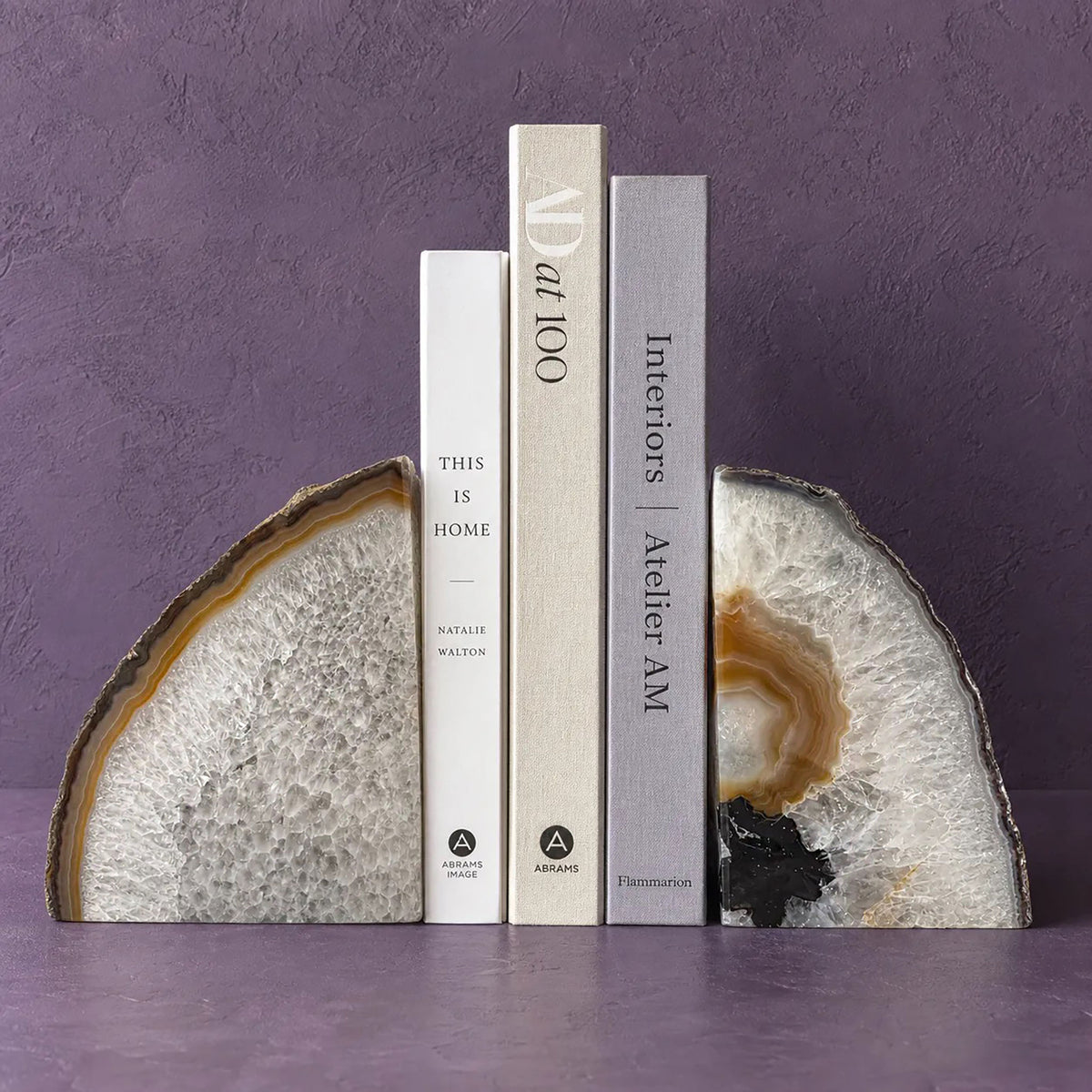 Pair of white and amber agate geode bookends, front view of both quartz crystal faces cut from one geode