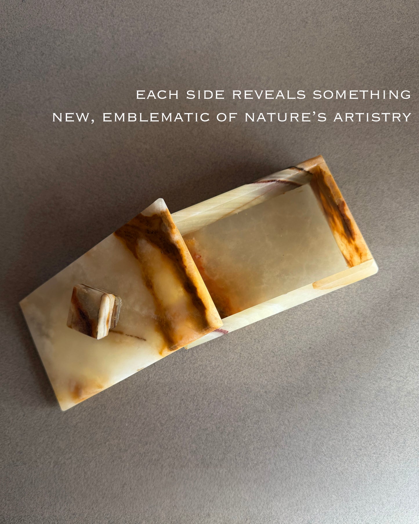 Natural onyx box with lid showing organic veining and matte stone finish
