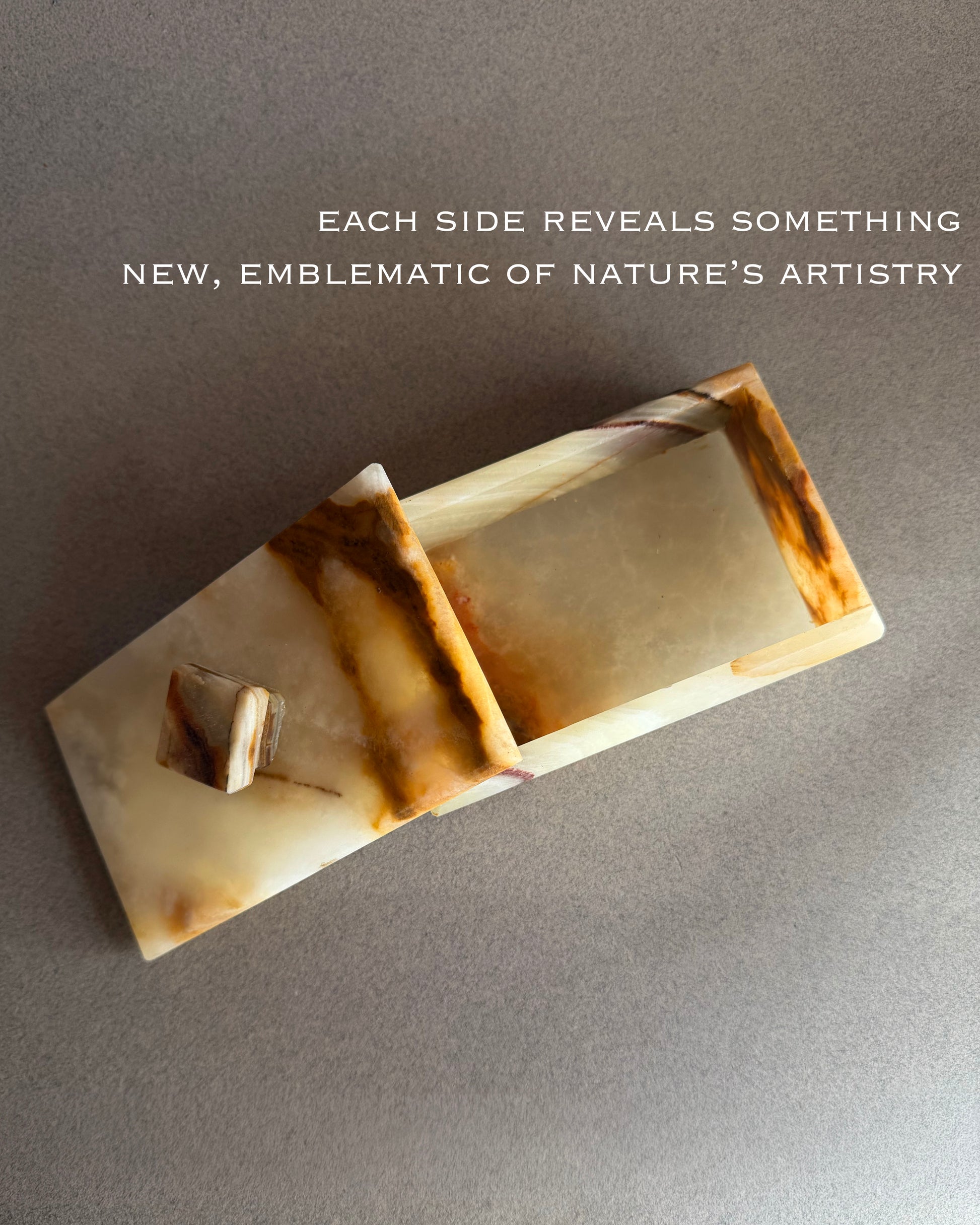 Natural onyx box with lid showing organic veining and matte stone finish
