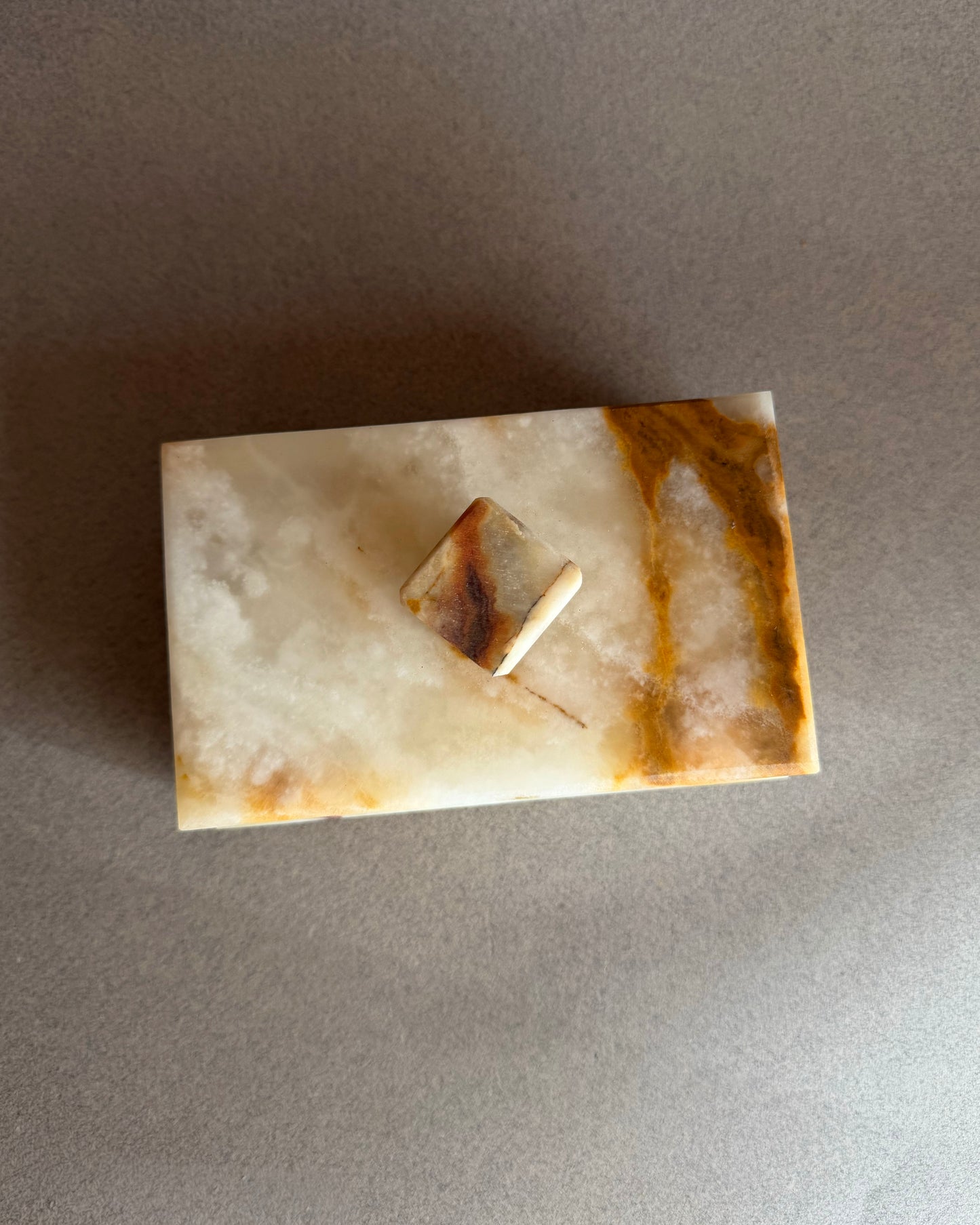 Artisan made onyx keepsake box carved from a single block of natural stone
