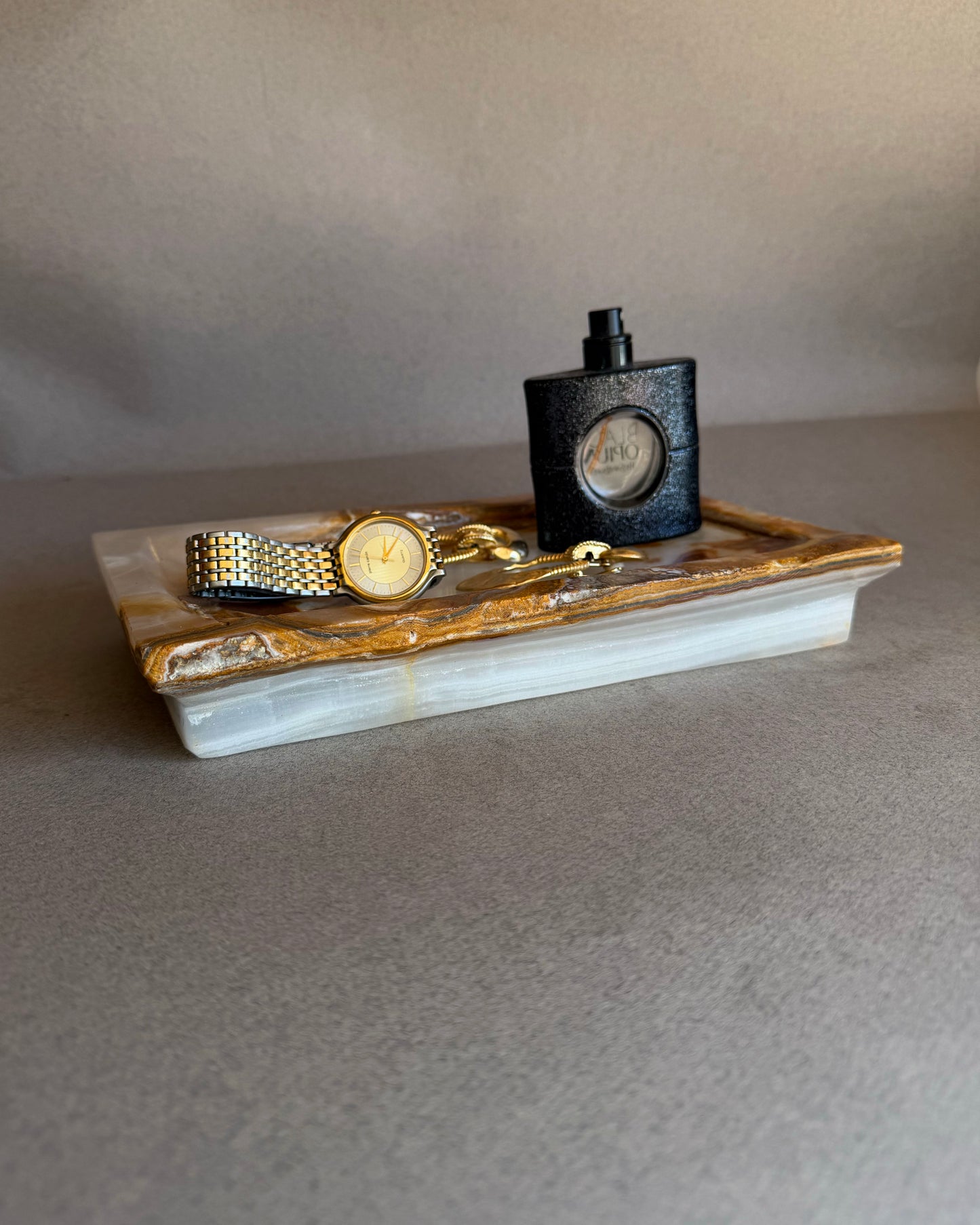 Raw onyx vanity tray with cream and brown contrast, sculptural stone decor tray for modern organic interiors
